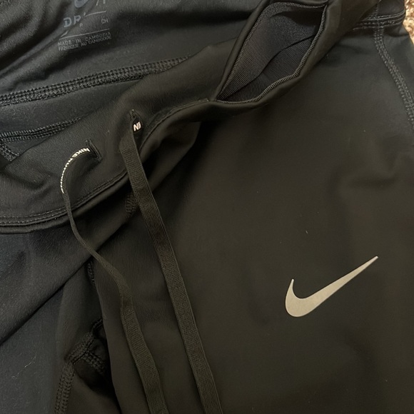 Nike Dri Fit size small black leggings. EUC. zip back pocket, mesh calf detail. - Picture 5 of 11